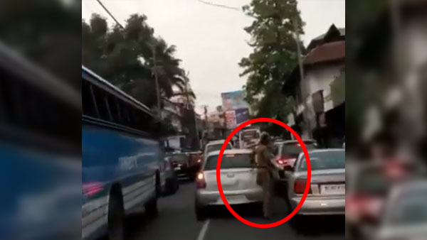 കൊടുക്കാം നല്ലൊരു സല്യൂട്ട് ഈ പോലീസുകാരന് — വീഡിയോ