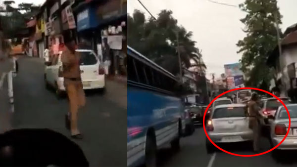 കൊടുക്കാം നല്ലൊരു സല്യൂട്ട് ഈ പോലീസുകാരന് — വീഡിയോ