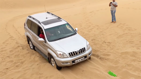 മണലിൽ കുടുങ്ങി ലാൻഡ് ക്രൂയിസറും ഫോർച്യൂണറും, രക്ഷപ്പെട്ടത് കഷ്ടിച്ച് — വീഡിയോ