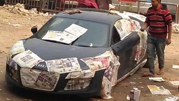 വഴിയോരത്തെ വര്‍ക്ക്‌ഷോപ്പില്‍ രണ്ട് കോടിയുടെ ഔഡി കാര്‍ പെയിന്റിംഗിന് — ചിത്രങ്ങള്‍ വൈറല്‍