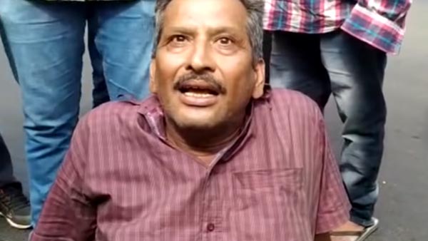 മകന് ലഭിച്ച പിഴയ്ക്കെതിരെ റോഡിൽ കിടന്ന് അച്ഛന്റെ പ്രതിഷേധം; വീഡിയോ വൈറൽ