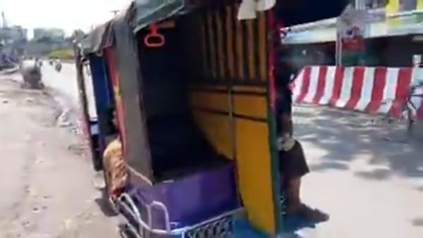 സാമൂഹിക അകലത്തിന് നൂതന ആശയവുമായി ഇ-റിക്ഷ ഡ്രൈവർ; വീഡിയോ വൈറൽ