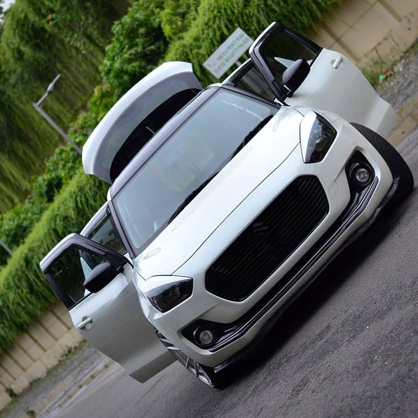 കസ്റ്റം അലോയികളുമായി ലോ റൈഡർ രൂപത്തിൽ തിളങ്ങി മാരുതി സ്വിഫ്റ്റ്