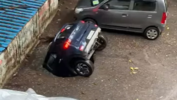 എളുപ്പവഴികൾ ചിലപ്പോൾ തിരിച്ചടിയായേക്കാം; പാർക്കിംഗിൽ സിങ്ക് ഹോളിൽ മുങ്ങിത്താണ് ഹ്യുണ്ടായി വെന്യു