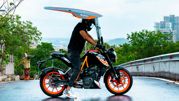 മഴയും വെയിലും ഏൽക്കേണ്ട; ഹിറ്റായി ഇരുചക്ര വാഹനങ്ങളിലെ പുത്തൻ ഷീൽഡ് സജ്ജീകരണം