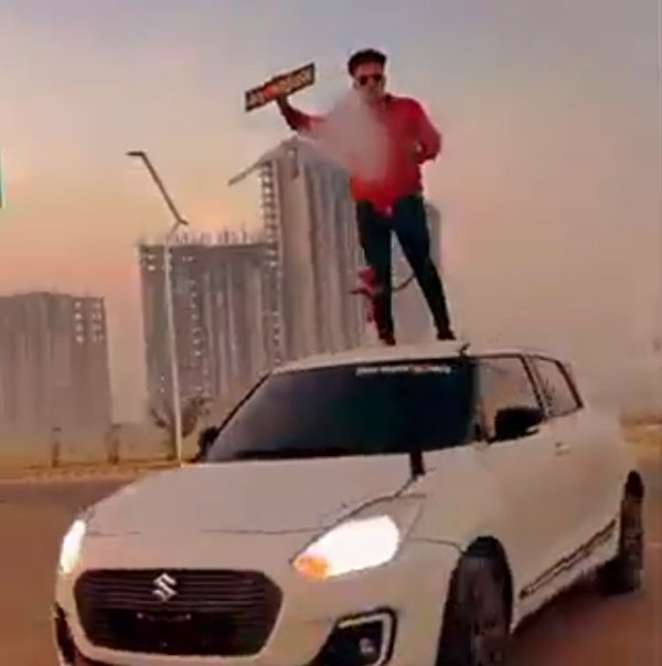 റീല്‍സിടാന്‍ എന്തും ചെയ്യും! വൈറലാകാന്‍ കാറിന് മുകളില്‍ ഹുക്ക വലിച്ച യുവാവ് എയറിലായി
