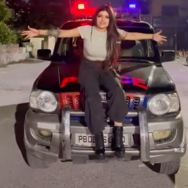 instagram influencer sits punjab police mahindra scorpio bonnet instagram influencer sits punjab police mahindra scorpio bonnet
