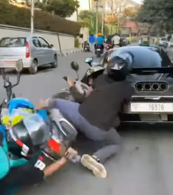 scooter crashes into mclaren 765 lt