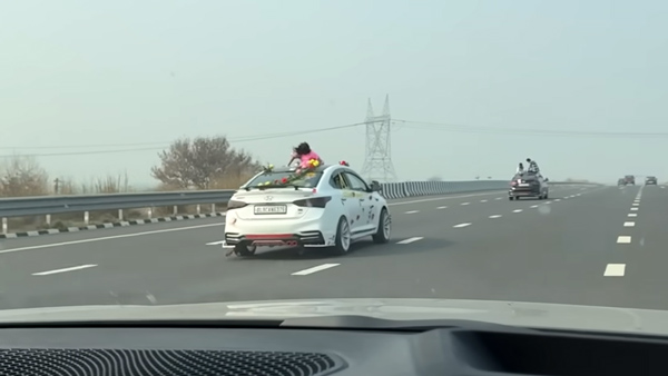 wedding photoshoot in moving car