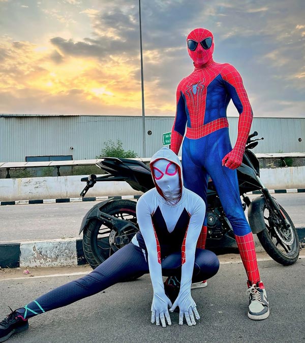 spiderman couple bike ride arrested