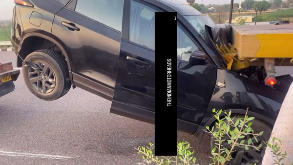tata harrier crashes into parked truck