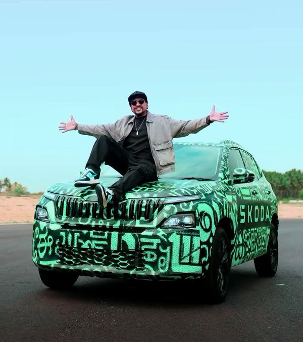 skoda klylaq artist shows camouflaged suv
