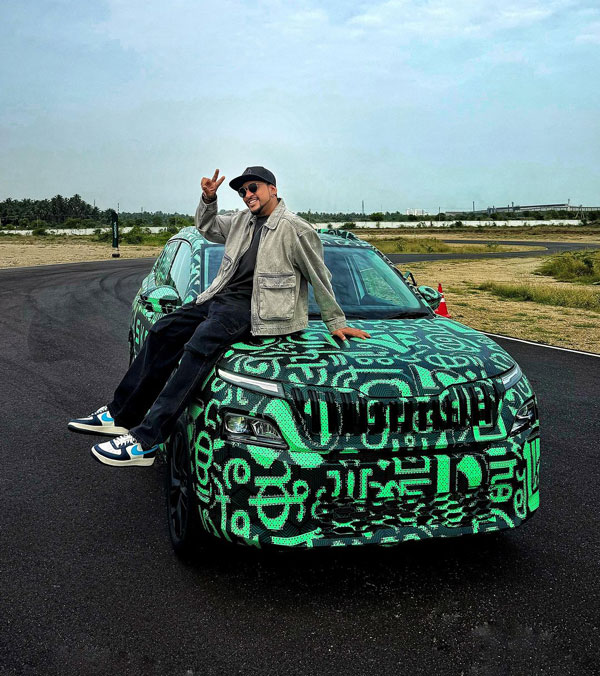 skoda klylaq artist shows camouflaged suv