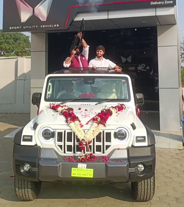 Man Fired Gun While Taking Delivery Of His New Mahindra Thar Roxx Man Fired Gun While Taking Delivery Of His New Mahindra Thar Roxx