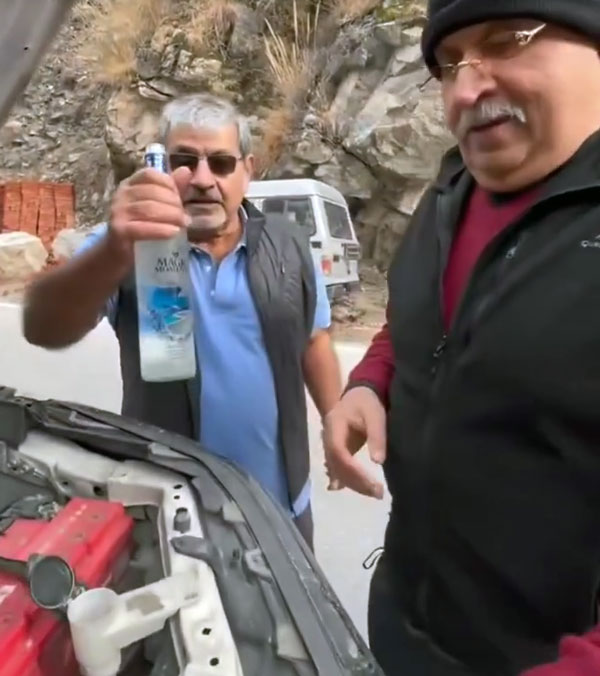 Old Gentleman Adding Vodka To Toyota Fortuner Old Gentleman Adding Vodka To Toyota Fortuner