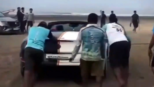 ferrari stuck beach bullock cart rescued