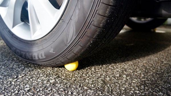 lemon under new vehicle tyre