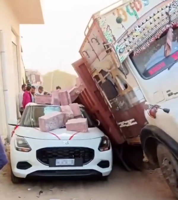 truck with bricks falls on maruti swift