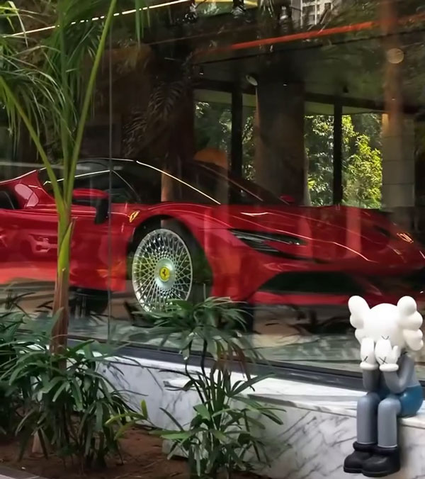 harsh kotak showcases parked ferrari sf90