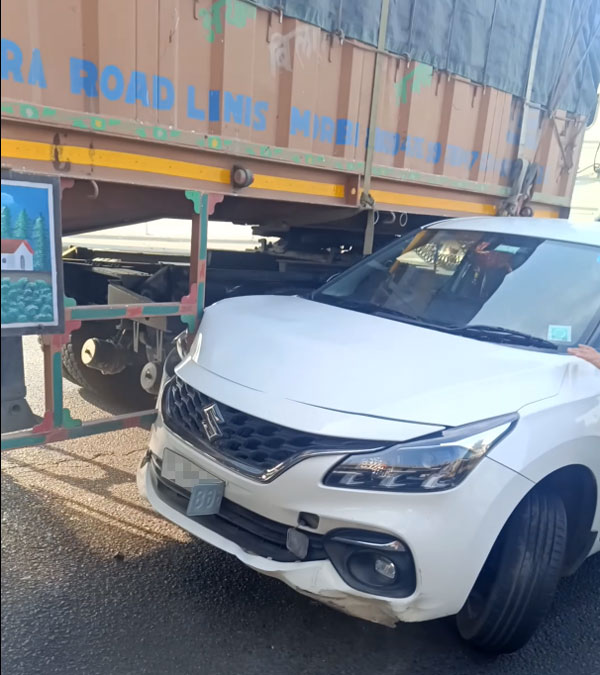 maruti baleno driver wrong side dragged by truck