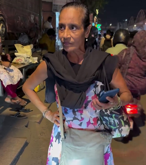 woman blocks triumph street triple rs rider