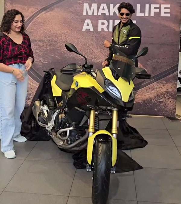 bb winner akhil marar bmw bike