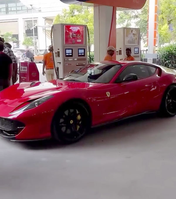 How Much You Need To Pay For A Full Tank Of Petrol In Ferrari Explained In Malayalam