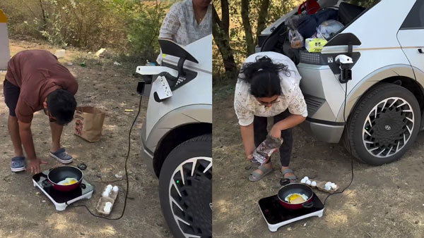 couple cooks omelettes using v2l feature couple cooks omelettes using v2l feature