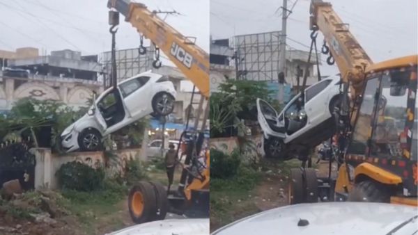 tata altroz stuck on compound wall telangana