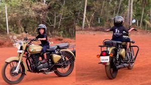 இந்த குழந்தைக்கு என்ன வயசுனு சரியா சொல்லீட்டா நீங்க கில்லி! வெயிட்டான ராயல் என்பீல்டு பைக்கை அசால்டா ஓட்டுதே!