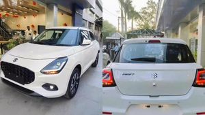 வெள்ளை நிறத்தில் ஷோரூமில் கெத்தாக காட்சியளிக்கும் புதிய ஸ்விஃப்ட்... ஒரு லிட்டருக்கே 25 கிமீ தருமா!