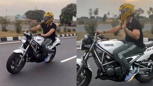 யாருக்கும் தெரியாமல் போனாலும் ரசிகர்கள் கண்டு பிடிச்சிடுறாங்க!! ஹெல்மெட்க்குள் இருப்பது இவ்வளவு பெரிய பிரபலமா?