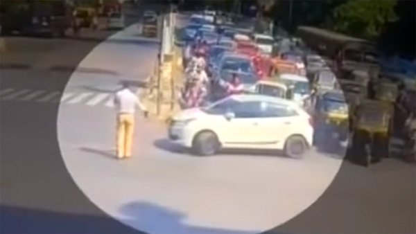 காரை ஏற்றி கொலை செய்ய முயன்ற இளைஞரை சினிமா பாணியில் விரட்டி பிடித்த போலீசார்... வைரல் வீடியோ காரை ஏற்றி கொலை செய்ய முயன்ற இளைஞரை சினிமா பாணியில் விரட்டி பிடித்த போலீசார்... வைரல் வீடியோ