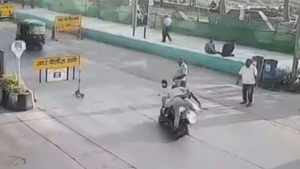 கை காட்டி நிறுத்த முயன்ற போலீஸ்காரர் மீது டூவீலரை ஏற்றிய இளைஞர்... தெரிந்தே செய்த வீடியோ வைரல்...