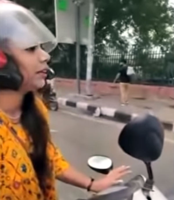 இது புது ஐடியாவா இருக்கே... போலீசிடம் இருந்து நைசாக தப்பித்த இளம்பெண்... என்ன செய்தார் தெரியுமா?