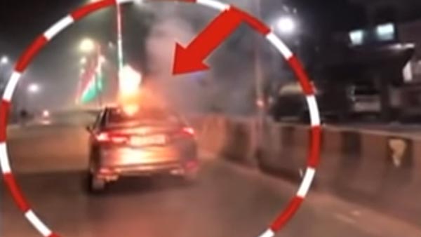 வைரலாகும் வீடியோ... காரின் சன் ரூஃப் வழியாக ராக்கெட் லான்ச் செய்த 'விஞ்ஞானிகளை' போலீஸ் தேடுகிறது...