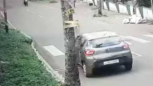 சாலையை கடக்க முயன்ற சிறுமி.. காற்றில் தூக்கி வீசிய அதிவேகமாக வந்த கார்... பதைபதைக்க வைக்கும் அதிர்ச்சி வீடியோ..!