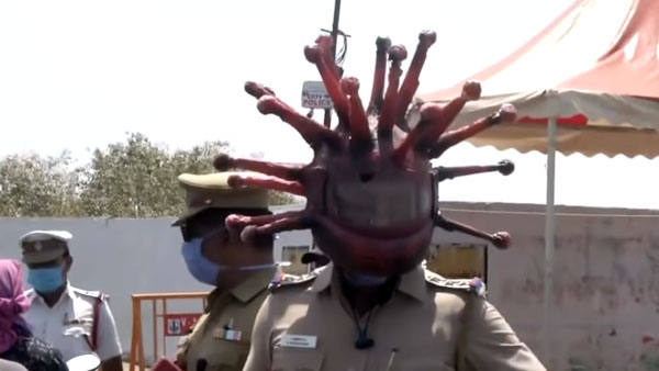 கொரோனா ஹெல்மெட்டிற்கு காரணம் இதுதான்... தமிழ்நாடு போலீஸ் எப்பவுமே வேற லெவல்... தூள் கௌப்புங்க சார்