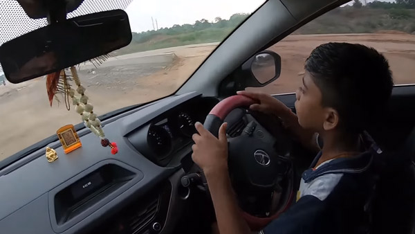 இருவரது உயிரை பணயம் வைத்து காரை ஓட்டிய 10 வயது சிறுவன்... வைரலாகும் வீடியோ...