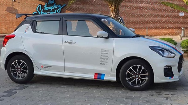 பிஎம்டபிள்யூ எம் கார்களின் ஸ்டிக்கருடன் மாடிஃபைடு மாருதி ஸ்விஃப்ட்... மொத்தம் இவ்வளவு தான் செலவானதா?