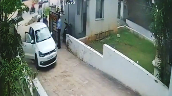 பாவம் அந்த வாட்ச்மேன்... காரை நிறுத்திய கோவத்தில் பெண் செய்த காரியம்... வீடியோ பாத்தா கோவப்படுவீங்க