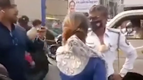 கோபத்தில் இளம்பெண் செய்த காரியம்... அரண்டுபோன போலீஸ்... இணையத்தில் வைரலாகும் வீடியோ..!