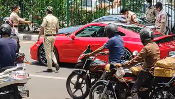 யாருக்கும் பயப்படாத போலீஸார்!! போர்ஷே கார் ஓட்டுனருக்கு அபராதம்... டெல்லியில் நடைபெற்றுள்ள தரமான சம்பவம்