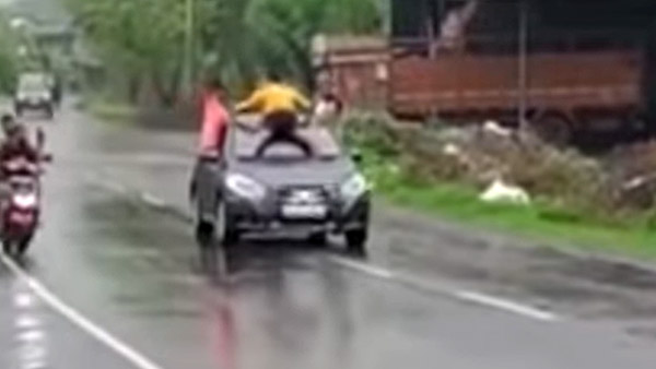 காரின்மீது படுத்து சென்ற இளைஞர்கள்... தேடும் காவல்துறை... இப்படி பண்ணாதீங்கனு சொன்ன எங்க கேக்குறாங்க...