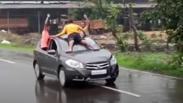 காரின்மீது படுத்து சென்ற இளைஞர்கள்... தேடும் காவல்துறை... இப்படி பண்ணாதீங்கனு சொன்ன எங்க கேக்குறாங்க...