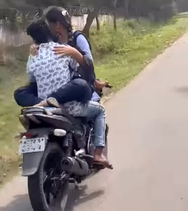 காதல் ஜோடியின் பயமுறுத்தும் பைக் ஸ்டண்ட் - வைரல் வீடியோ!!