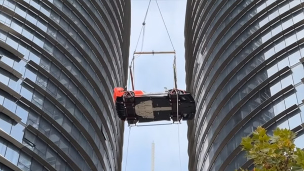 mclaren senna gtr lifted to 57th floor apartment