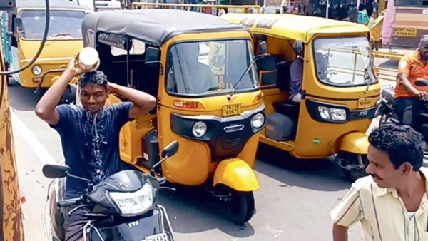 Tamil Nadu Scooter Rider Takes Bath On Road
