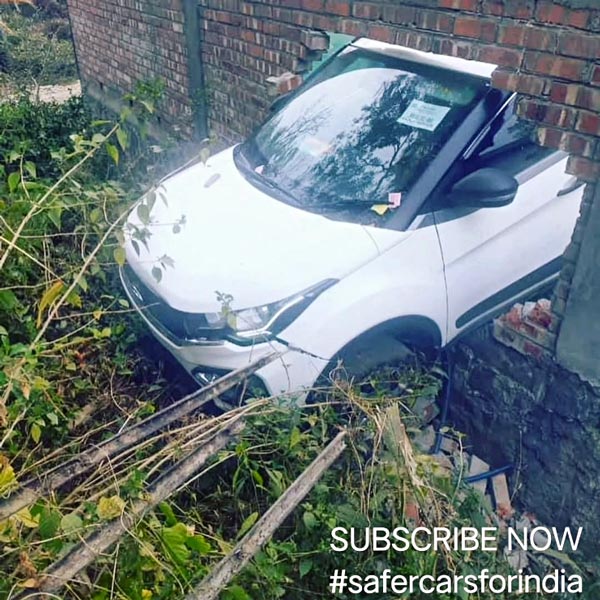 tata nexon hit & stuck in wall