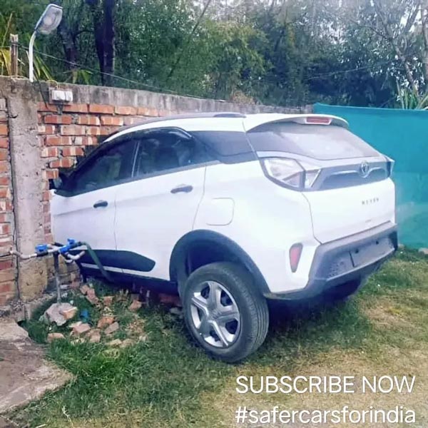tata nexon hit & stuck in wall